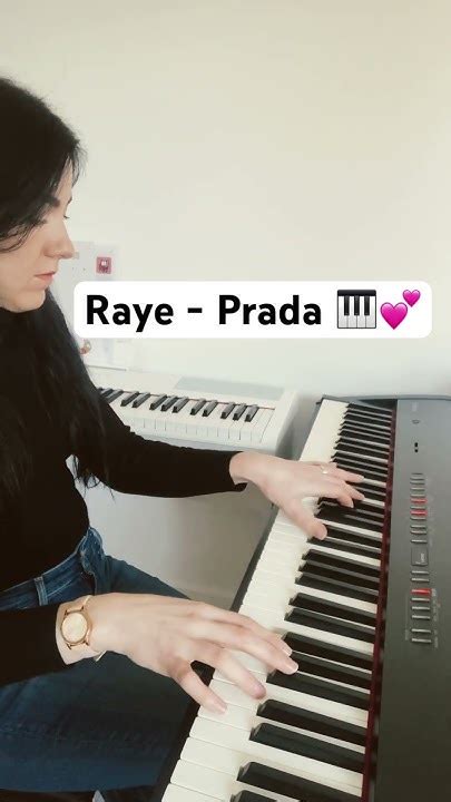 prada on piano|RAYE .